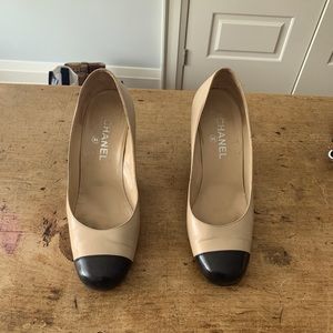 Vintage Chanel pumps with the classic beige and black round toe.